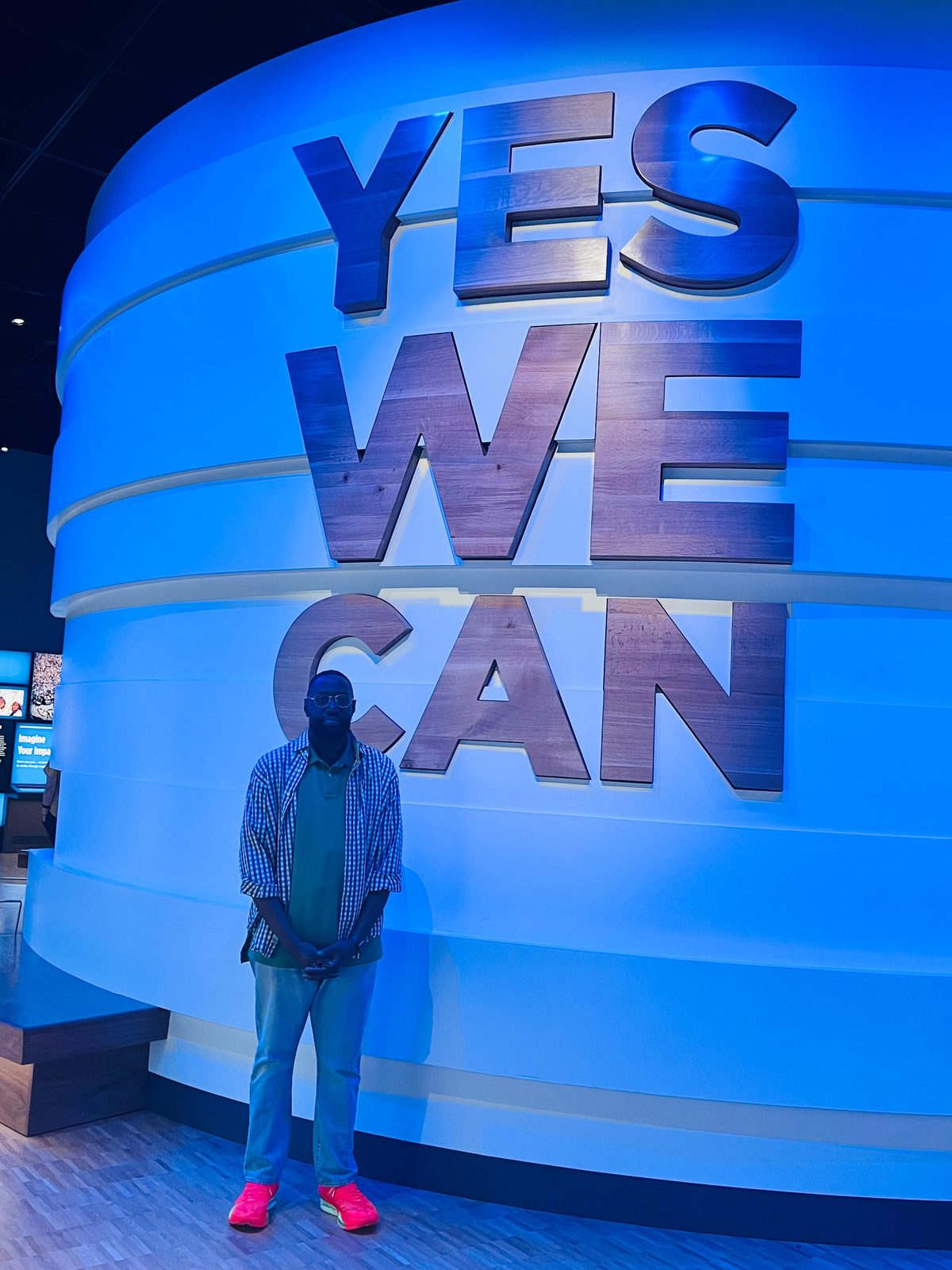 Bambo Adeshiyan at the Yes We Can wall inside the Obama Presidential Center in Chicago